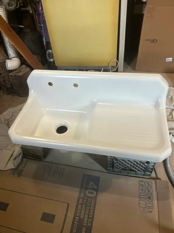 Refinished white sink with clean glossy surface